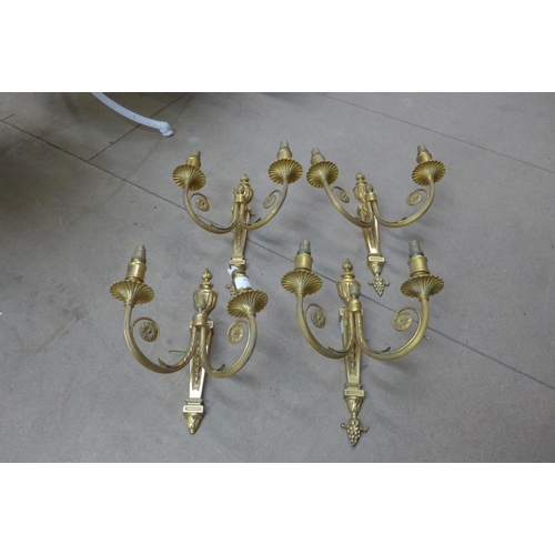 331 - A set of four gilt metal wall sconces, one a/f