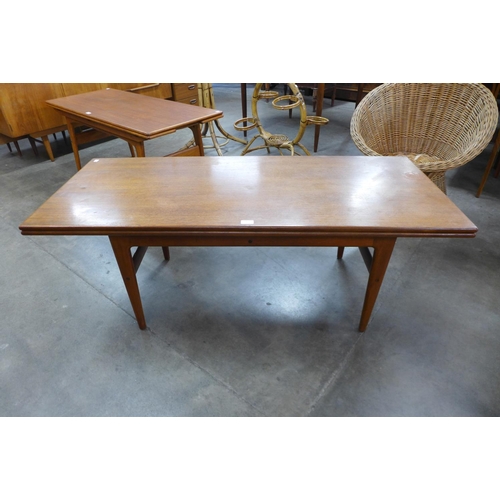 100 - A Danish teak metamorphic coffee/dining table