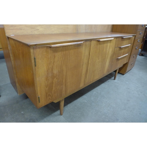 101 - A teak sideboard