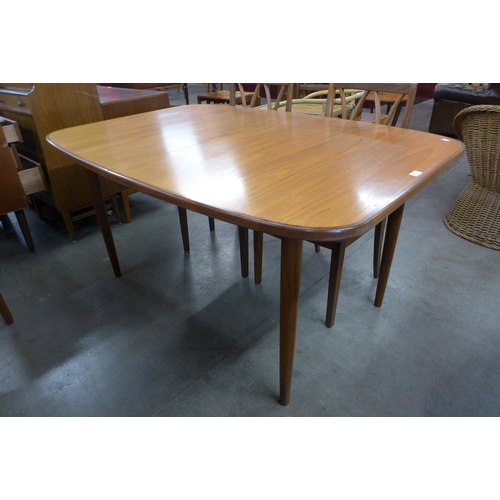 127 - A G-Plan Fresco teak extending dining table and four chairs