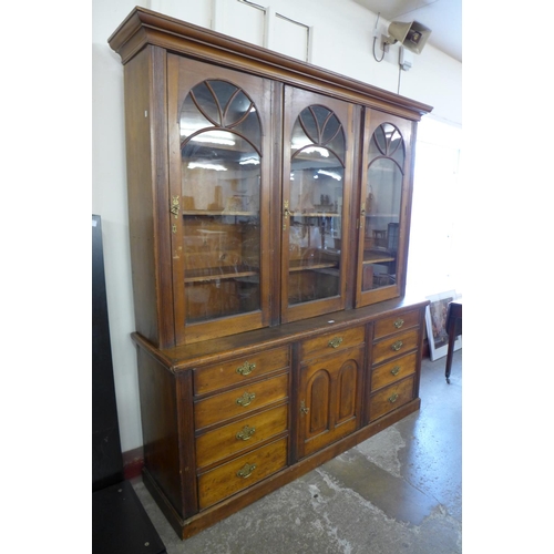 134 - A George III style walnut library bookcase