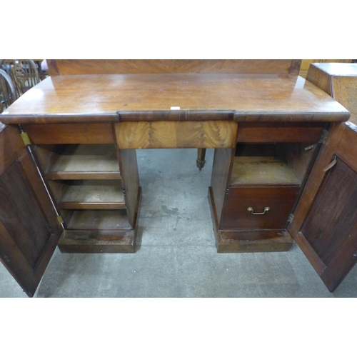 142 - A Victorian mahogany breakfront pedestal sideboard