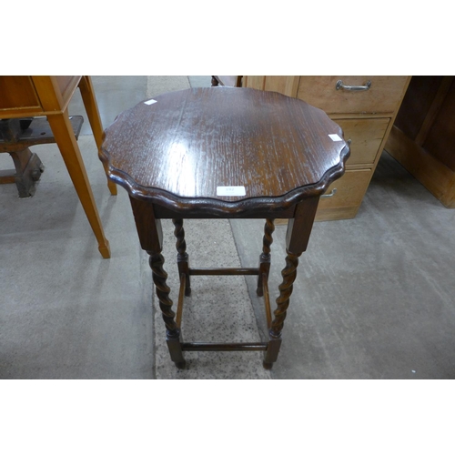 192 - An oak barleytwist occasional table