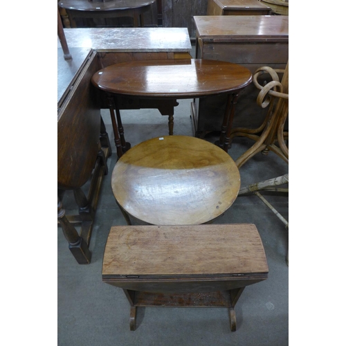 198 - A Victorian mahogany oval stretcher table, circular walnut occasional table and a drop-leaf occasion... 