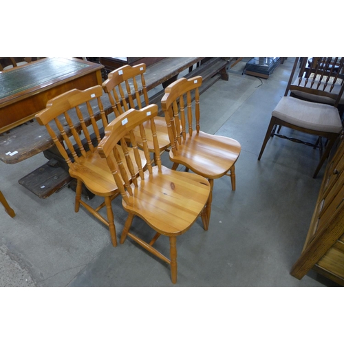 203 - A set of four pine chairs