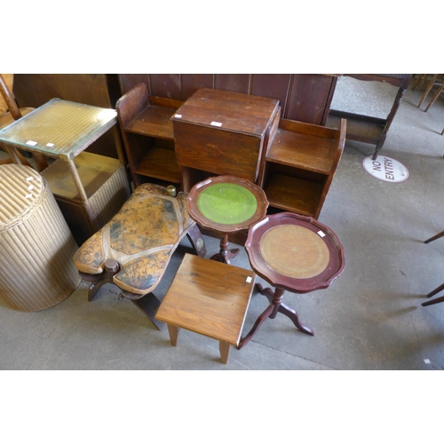 213 - A small oak bookcase, two wine tables and two stools