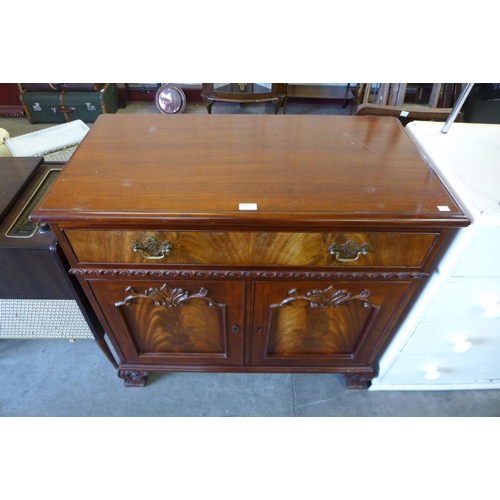 215 - A Victorian style mahogany two door side cabinet