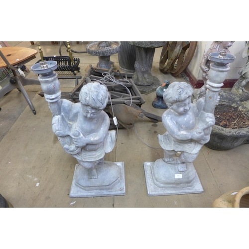 287 - A pair of painted wood cherub table lamps