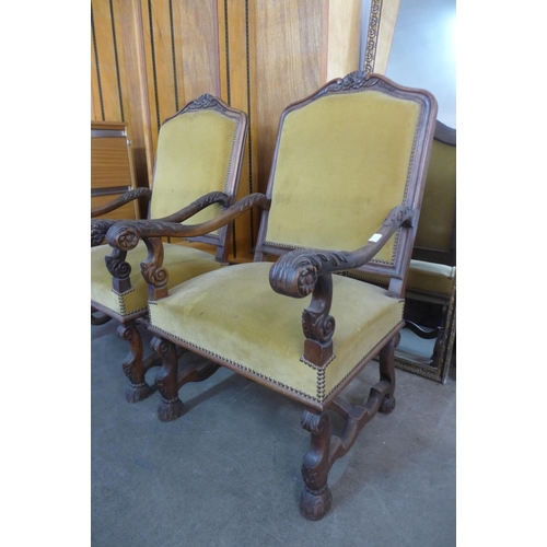 31 - A pair of 19th Century French carved mahogany and upholstered fauteuils