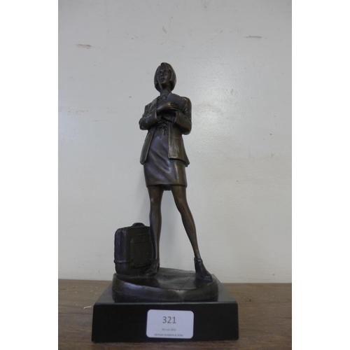 321 - A bronze figure of a school teacher