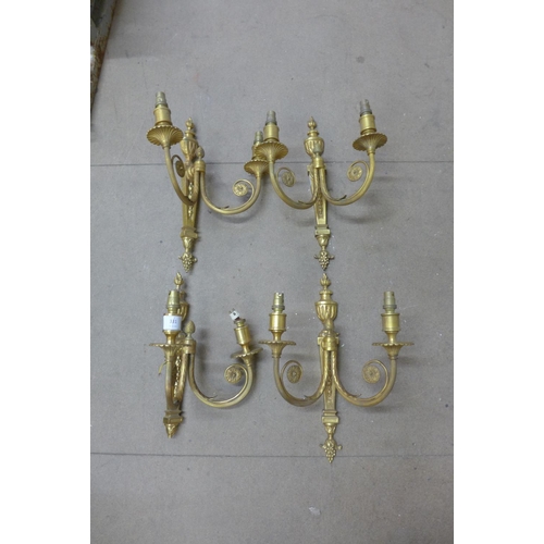 331 - A set of four gilt metal wall sconces, one a/f