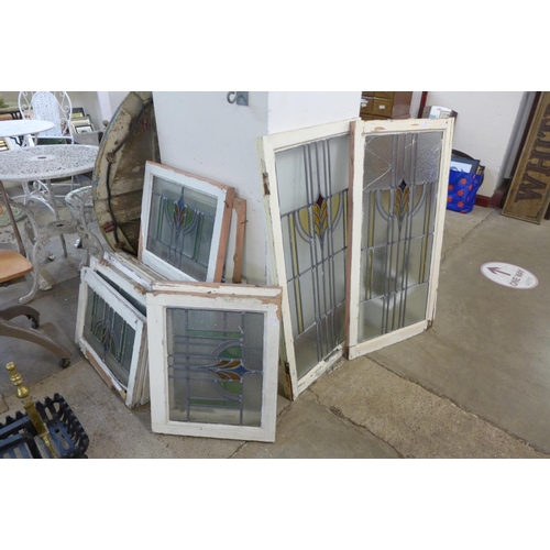 359 - A set of sixteen Art Deco stained glass windows