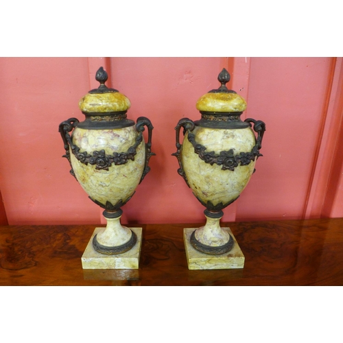 57 - A pair of Sienna marble and gilt metal mounted casolettes and covers