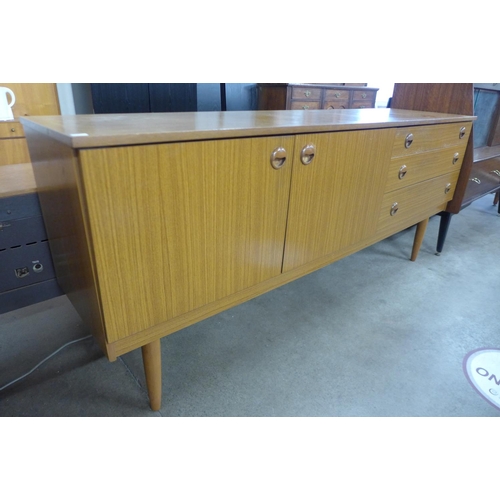 90 - A teak sideboard