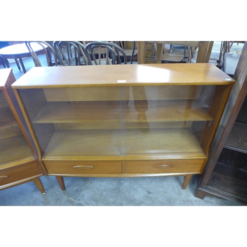 94 - A teak bookcase