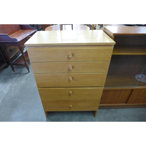 95 - A teak chest of drawers