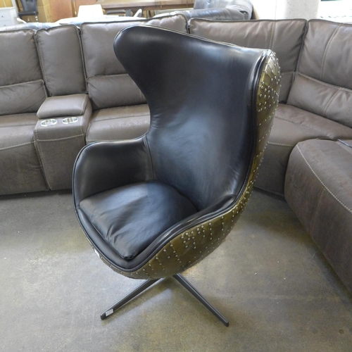 1561 - An Aviator swivel egg chair