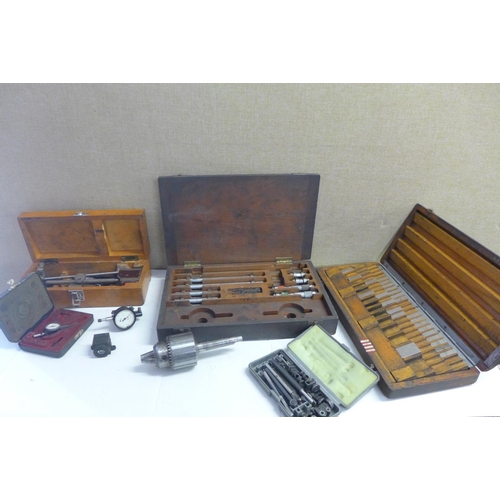 2028 - Box of engineering tools inc:- micrometers, 2 dial gauges, part set of slip gauges, chuck, magnetic ... 