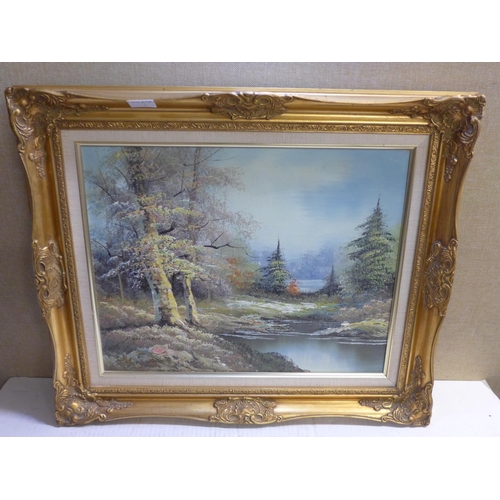 2163 - Gilt framed oil on canvas of a woodland/lake scene