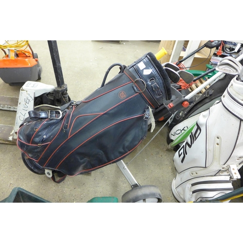 2235 - Wilson Ultra golf bag & clubs with trolley