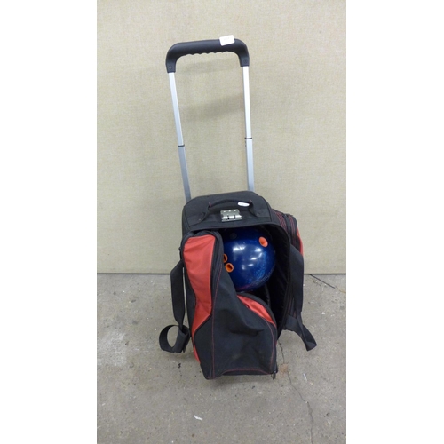 2257 - 2 ten pin bowling balls in a wheeled case