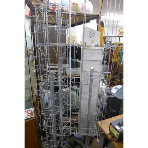 2291 - 4 Various revolving shop display racks