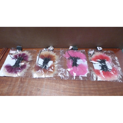 3115 - Ten rubber leaf flower lights ( packaged and unused)