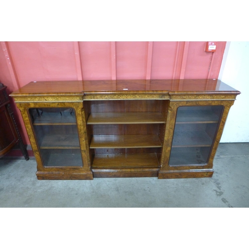 95 - A Victorian inlaid walnut and ormolu mounted breakfront bookcase