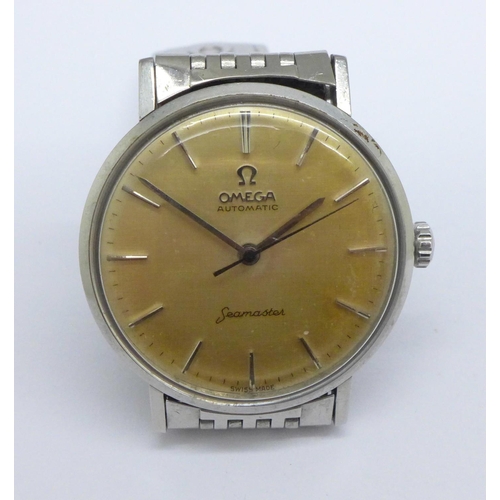 1084 - An Omega Seamaster automatic wristwatch, on an Omega bracelet strap, (with receipt for service dated... 