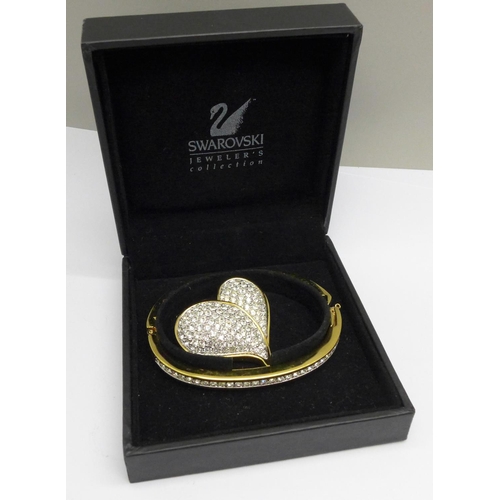 1101 - A Swarovski bangle and heart brooch, boxed