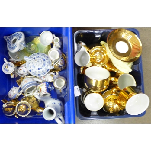 1117 - A collection of decorative china, a gilt tea service and a collection of empty Royal Doulton boxes a... 