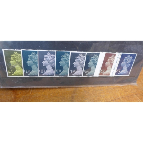 670 - Stamps;- GB items in album including presentation packs, booklets, postal history, high values inclu... 