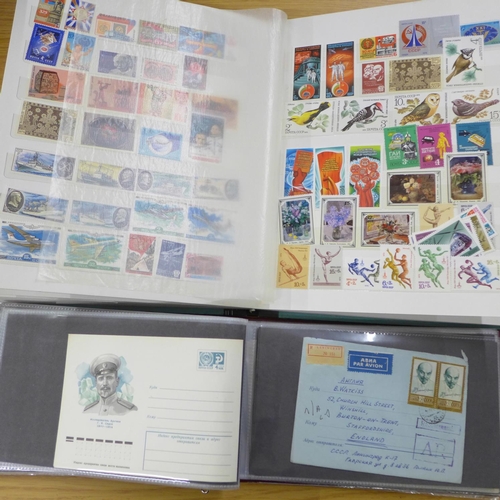 687 - Stamps; Russia mint stamps in stockbook and an album of postal history