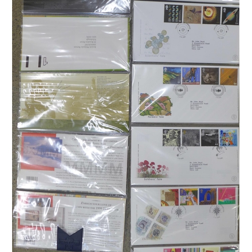 694 - A 1999 Millennium Series Collection, 12 presentation packs and 12 official first day covers in prese... 