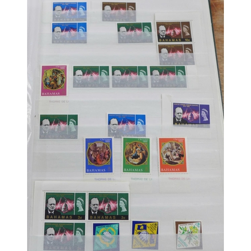 701 - An album of stamps and two sheets of nine Australia 5D stamps