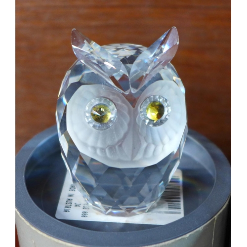 709 - Six items of Swarovski crystal and other crystal including owl, hedgehog and clown brooch, and a Bal... 