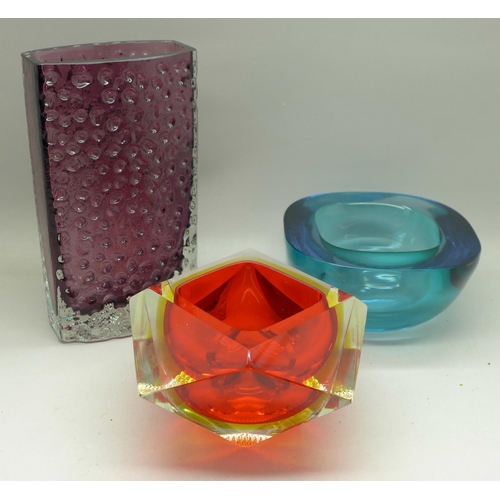 710 - Two heavy coloured glass bowls and a glass vase