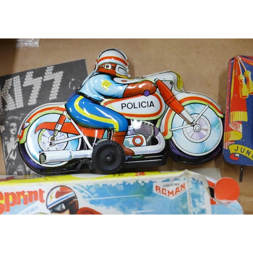 718 - Tinplate toys, a motorcycle and sports car and a Coronation ashtray