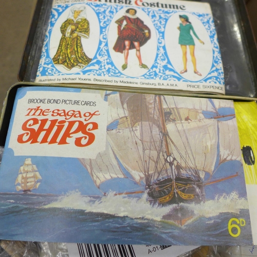 729 - Vintage games, etc., and tea cards