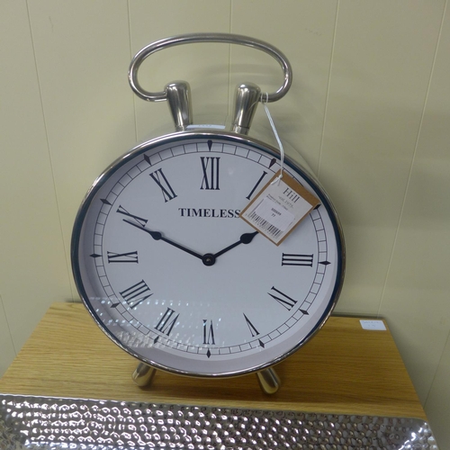 1429 - A circular chrome table clock with loop handle (1754225)   #