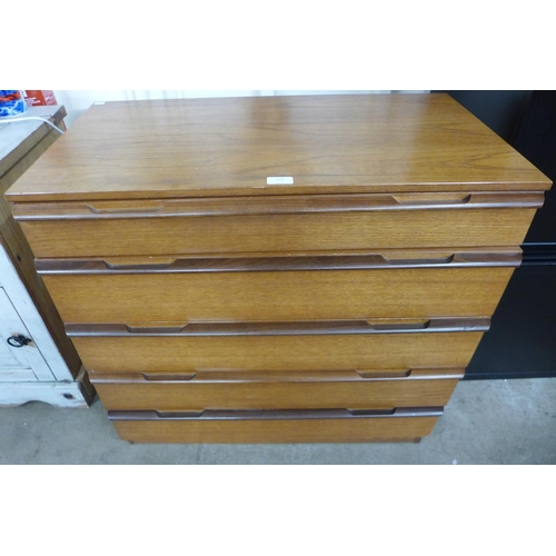 116 - A teak chest of drawers