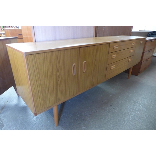 117 - A simulated teak sideboard