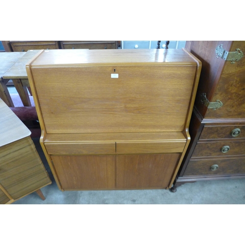 124 - A teak bureau