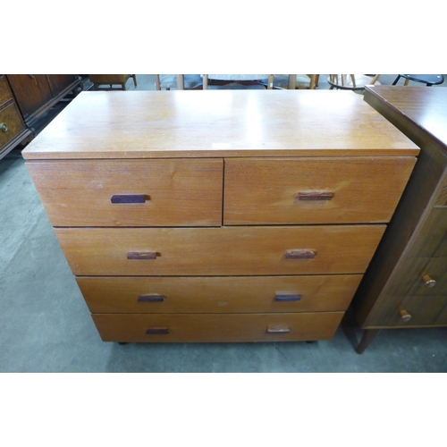 125 - A teak chest of drawers