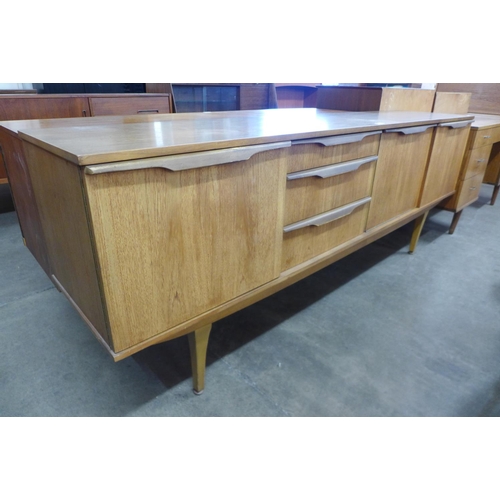 128 - A Stonehill Furniture teak sideboard