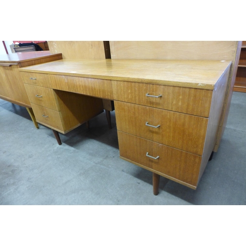 129 - A teak desk