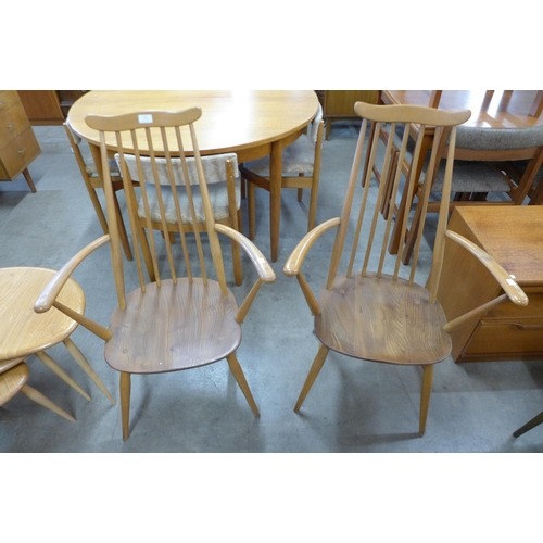 134 - A pair of Ercol Blonde chairs