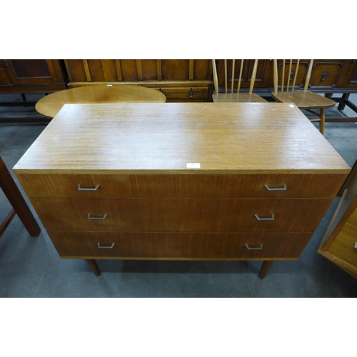 140 - A teak chest of drawers