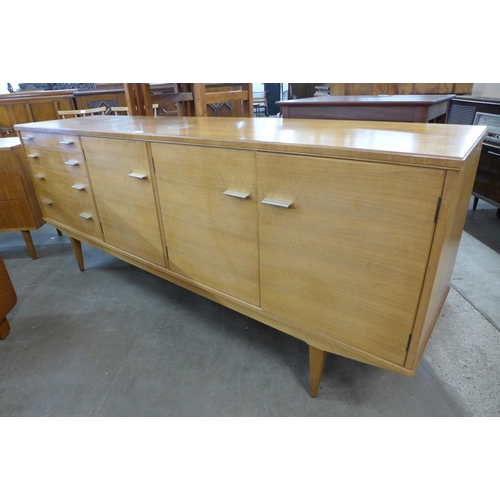 141 - An Alfred Cox teak sideboard