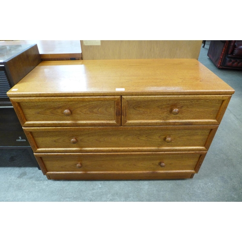 142 - A teak chest of drawers